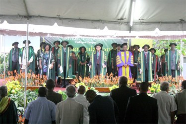 University of Guyana top brass on stage at the beginning of the 2013 Convocation ceremony