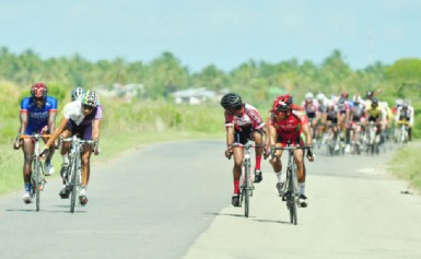 Action during yesterdays’ fourth stage of the seventh annual five-stage road race in Essequibo. (Orlando Charles photo) 