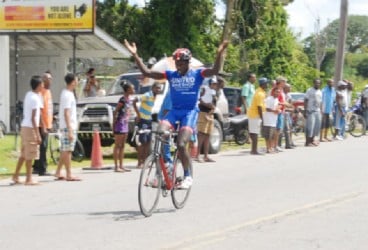 Team United’s Orville Hinds celebrating his stage win yesterday on Homestretch Avenue.