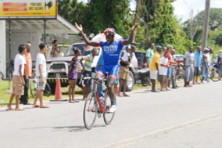 Team United’s Orville Hinds celebrating his stage win yesterday on Homestretch Avenue.