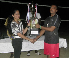 PMTC 1 skipper Seon Glasgow receiving the winning trophy from one the organizers.
