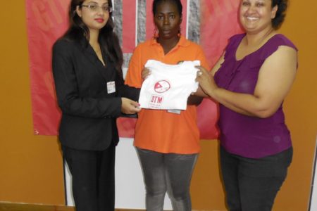 The Guyana and Trinidad Mutual Insurance Company (GTM) recently donated some 300 t-shirts to the National Road Safety Council (GNRSC) which were used in a walk last Sunday in observance of the United Nations’ World Remembrance Day for Road Traffic Victims. In this photograph GTM’s Fire Manager, Ramona Singh hands over t-shirts to the President of the GNRSC, Ramona Doorgen and another representative of the GNRSC.