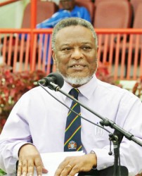 Acting president, Samuel Hinds addressing the athletes before he declared the 53rd Guyana Teacher’s Union/Ministry of Education (MOE) National School’s Cycling, Swimming and Track and Field Championships open. (Orlando Charles photo)