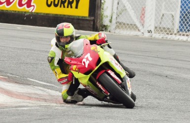 Stephen Vieira goes low as he negotiates this turn on his way to winning the Super Bike Segment of the Race