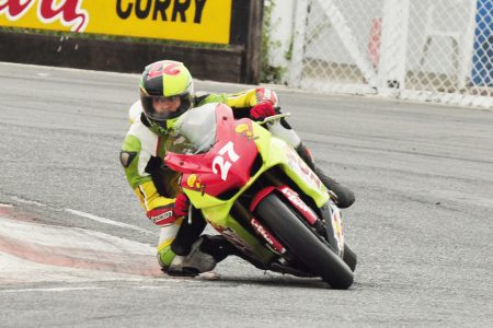 Stephen Vieira goes low as he negotiates this turn on his way to winning the Super Bike Segment of the Race