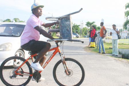 This cyclist was transporting a wheelbarrow on Mandela Avenue.