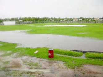 The waterlogged Enmore Community Centre Ground yesterday  