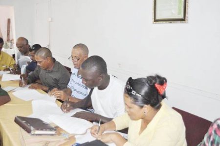 GAWU representatives signing the deal. (GAWU photo)