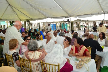 At the invitation of President Donald Ramotar and First Lady Deolatchmee Ramotar, members of the Muslim community and other invited guests were hosted to a luncheon and interaction on the lawns of State House on Saturday. In this GINA photo President Ramotar greets some of the invitees.