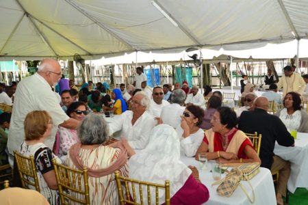 At the invitation of President Donald Ramotar and First Lady Deolatchmee Ramotar, members of the Muslim community and other invited guests were hosted to a luncheon and interaction on the lawns of State House on Saturday. In this GINA photo President Ramotar greets some of the invitees.