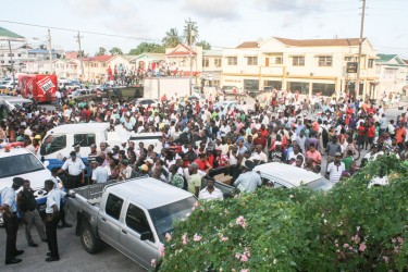 The crowd on hand after the siege on Middle Street on Tuesday ended.