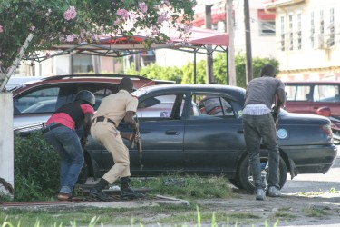 Some policemen had protective gear at the scene of the shoot-out, some didn’t