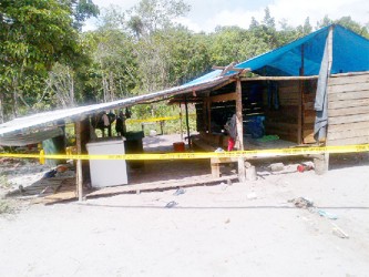 The camp that Molly James and her children called home. The zinc sheets were only put on yesterday, according to a relative. (Photo by Oluatoyin Alleyne)