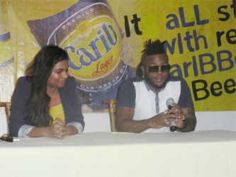 Trinidadian Klase ‘1st Klase’ Gonsalves (right), facilitator of a two-day music workshop, addresses the participants. With him is Public Relations Officer (PRO) of ANSA McAL Darshanie Yussuf.