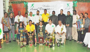 The 2013 awardees with their trophies and plaques 