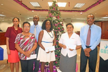  (L to R) Floret Ramsaran, Senior Manager of GBTI’s I.T. Department; Norma Hamilton, administrator of Uncle Eddie’s home; Sean Noel, Manager of Administration at GBTI; Marcelle George of the David Rose School for Handicapped Children; Laura Yangil Augusto of the Salvation Army, and John Barnes, Senior Manager of GBTI’s Risk Department at yesterday’s donation ceremony. 