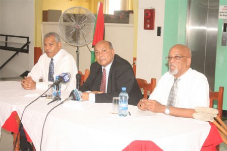 Chairman of Laparkan Glen Khan (centre) Chief Executive Officer of Laparkan, Hussein Haniff (left) and press conference moderator Ron Robinson yesterday. 