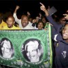 People chant slogans outside the house of former South African President Nelson Mandela after news of his death in Houghton, December 5, 2013.
REUTERS/Siphiwe Sibeko
