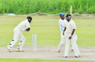 Devendra Bishoo cleans up fast-bowler Kellon Carmichael to claim his sixth wicket    