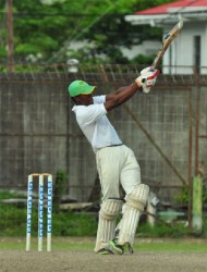 All-rounder Kemo Paul pulls aggressively through mid-wicket during his unbeaten 24. 