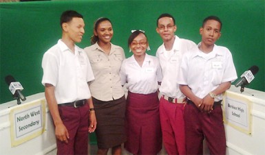 Students of North West Secondary and their teacher celebrate after winning the GGMC Science and Technology Quiz competition.  