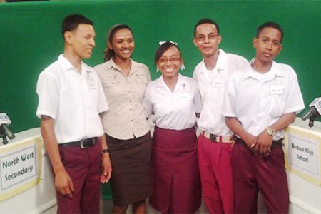 Students of North West Secondary and their teacher celebrate after winning the GGMC Science and Technology Quiz competition.
