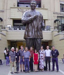 A German delegation of chess teachers stands beside a six-metre statue of Nelson Mandela at the Nelson Mandela Square in Johannesburg, South Africa. The delegation was promoting chess in South Africa on behalf of the German Chess Foundation. The FIDE Chess in Schools programme and the Kasparov Chess Foundation have noted the advantages of introducing chess in schools. This innovative method of learning has become clear to many countries of the world, and South Africa is one of them.