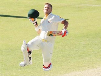 Australia’s David Warner is ecstatic after scoring his second century of the Ashes series yesterday to put his team firmly in the driver’s seat. (Photo courtesy of Cricket365) 