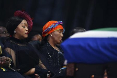 Makaziwe Mandela (C), daughter of former South African President Nelson Mandela, attends his funeral ceremony in Qunu December 15, 2013.
REUTERS/Odd Andersen/Pool