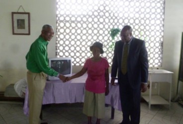A television being presented to Doris Nero