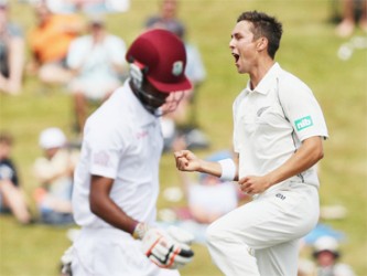 Trent Boult, right,  and Tim Southee were responsible for dismissing the West Indies top and lower order respectively. (Photos courtesy of Cricket 365)  