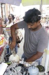 Blender repair at the Vendor’s Arcade on Water Street on Monday. 