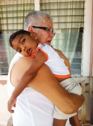Vishal being comforted in Ann Geer’s arms during the visit 