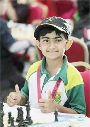 The World Chess Youth Championships 2013 are underway in the United Arab Emirates in the garden city of Al Ain, and eighteen hundred chess players from 120 countries are participating. There are six Girls’ sections and six Open sections in age groups numbering from U8 to U18. The FIDE organizers have noted that chess is a global sport. In picture young Yashil Modi represents South Africa in the U8 section of the tournament. South Africa has entered the Championships with 38 warriors to fight for the titles!
