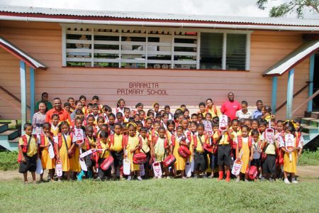 Students and teachers of Baramita Primary with Communications Manager Vidya Bijall-Sanichara and Sponsorship  Manager Gavin Hope. Digicel donated a host of supplies to students over the weekend. (Digicel photo)