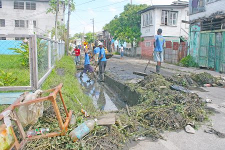 This Hunter Street, Albouystown drain gets a long overdue cleaning today