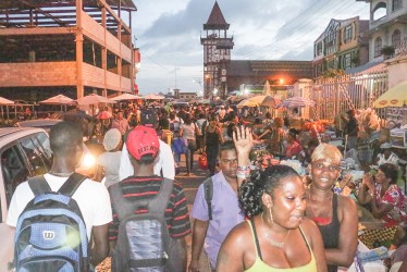 Getting in last-minute shopping on Water Street this evening