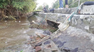 The large hole at the side of the seawall 