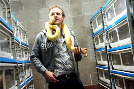 Jeremy Stone of Lindon, Utah, was photographed with an albino boa constrictor for a profile that ran in the New York Times in 2011. (Djamila Grossman/New York Times photo)
