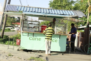 A cane juice and snackette stall  