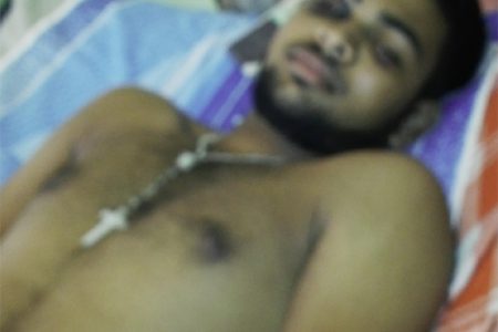 Yajendra Lall on his hospital bed.