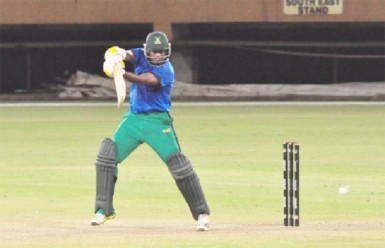 Narsingh Deonarine cuts a delivery during his unbeaten knock. (Orlando Charles photo) 