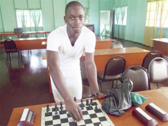 There seems to be a strenuous commitment towards the promotion of chess in schools on the part of 17-year-old Carlos Rahaman (in photo above) of One Mile, Wismar. Carlos is currently tutoring, at his own request, some 24 students of the Silver City Primary school, Wismar. He turned up to play in the Trophy Stall chess tournament two weeks ago, but arrived late travelling from Black Bush Polder, and regrettably, he could not participate. But he is confident he would be back for a subsequent tournament of the Chess Federation, and this time he would be accompanied by some of his “grandmaster?” prospects ! 