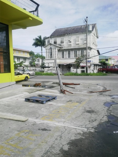 This GT&T utility pole at the corner of Albert and Regent streets was ripped out of the ground yesterday at around 2 am, when it was reportedly hit by a vehicle.  An unidentified man was said to have been pronounced dead at the scene, after he was hit off his motorcycle.  