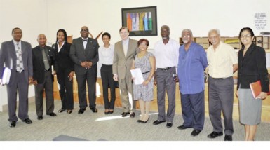 L-R in this GNCCP photo are Adrian Thompson, Pastor Dextor N.A. Sansaulotte, Shabakie Fernandes, Dr. Philip H. Mozart Thomas, Tracy Chan Smith, U.S. Ambassador Brent Hardt, Patricia Phillips, Norris Witter, A.A. Fenty, Vic Insanally and Clarissa Riehl.