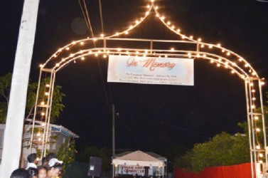 Residents of Lusignan have erected an arch in remembrance of the 11 residents killed in the January 26, 2008 massacre. It was officially opened during a remembrance event held by the Indian Arrival Committee on Sunday. (Government Information Agency photo)