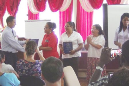 (from left to right) GBTI Lethem manager André Yhap presenting plaques to the 4 finalists - Rosamund Benn (Pomeroon women’s), Alicia Gouveia (Waini Naturals) Ayli Cenepo Quinteros (Peru), Ebelin Patricia Solorzano (Peru)
