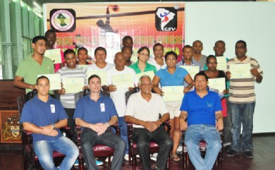 Front row from left- instructors’ Rodrigues Roberto and Fernando Costa Marques, GVF President Lennox Shuffler and clinic Coordinator Captain John Flores surrounded by the successful participants. (Orlando Charles photo) 