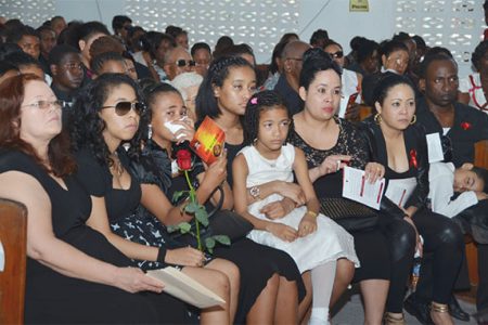 Relatives at Trevor Rose’s funeral service yesterday. 
