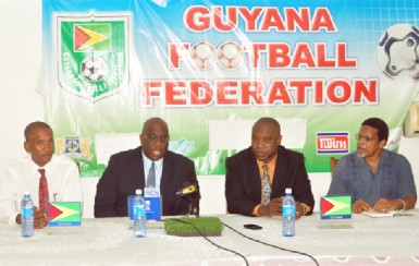  FIFA Developmental Officer Howard McIntosh (second left) addressing the media gathering during yesterday’s GFF press conference while members of the GFF inclusive of Committee Member Keith O’Jeer (left), President Christopher Matthias (second right) and General Secretary Noel Adonis look on. (Orlando Charles photo) 